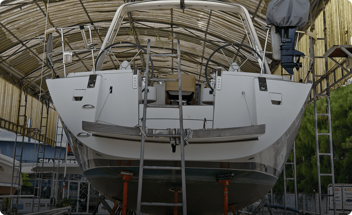 Sailboat in repair dock shelter